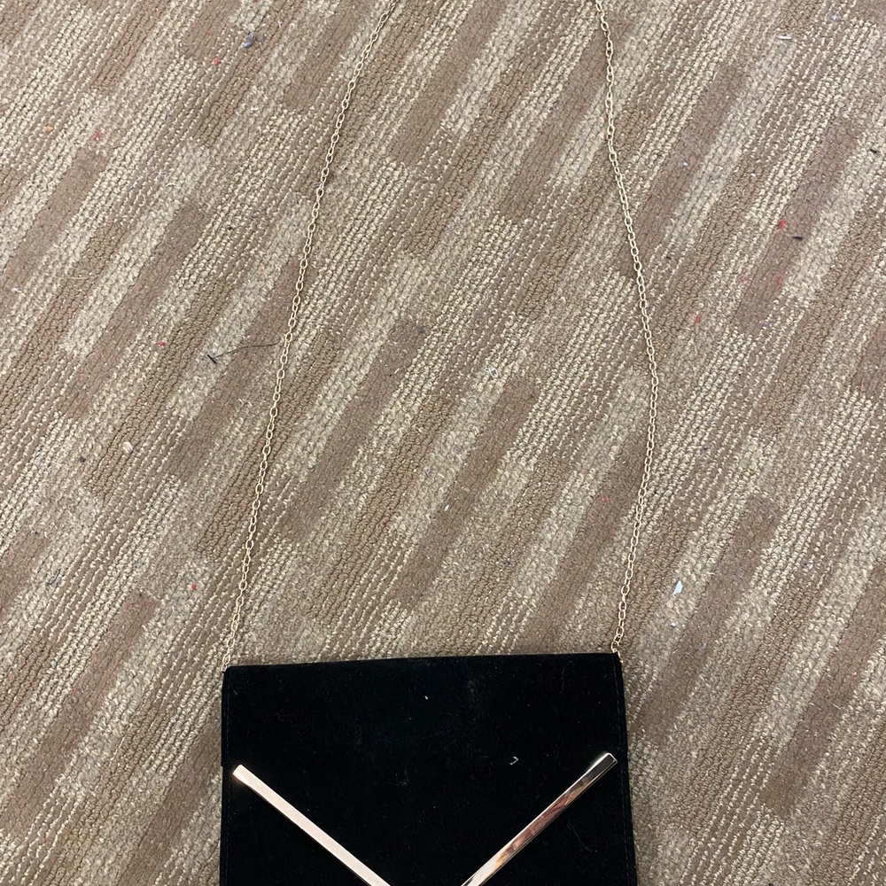 Elegant Black Clutch with Gold Accents